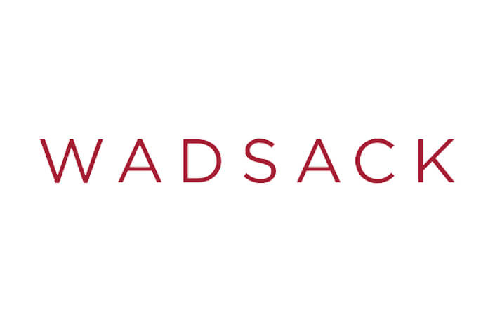 The logo for Wadsack on white background.