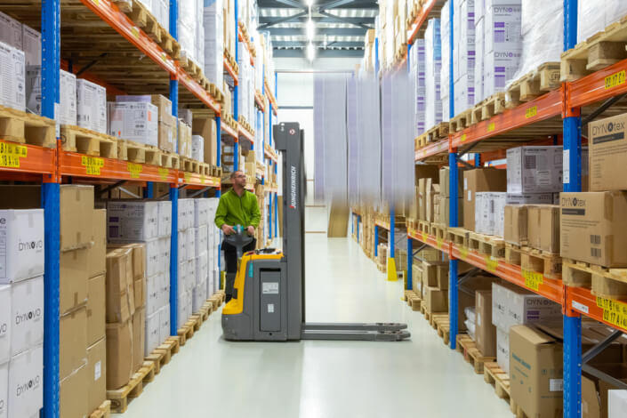 A forklift truck in a warehouse.