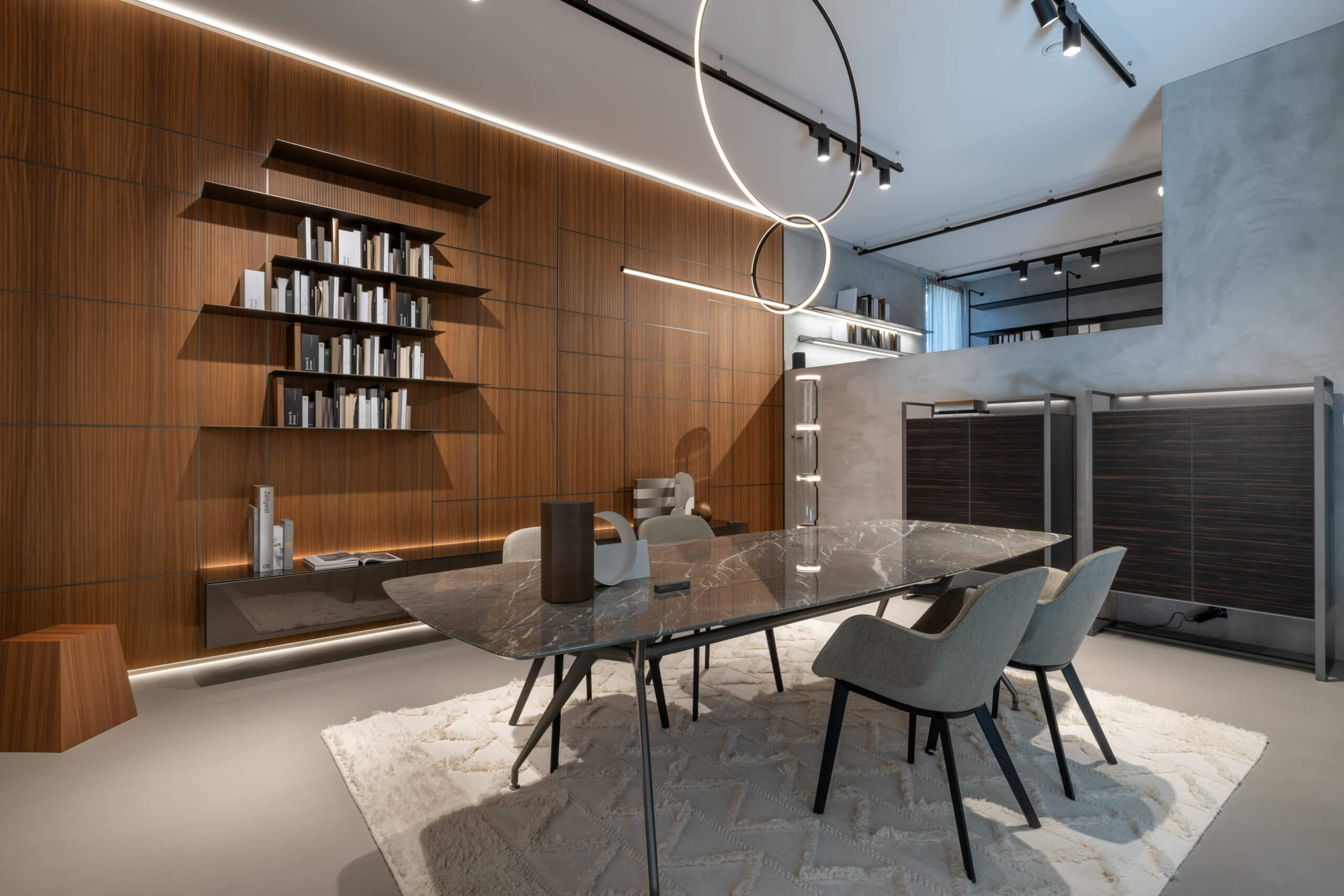 A modern dining room with a wooden wall.