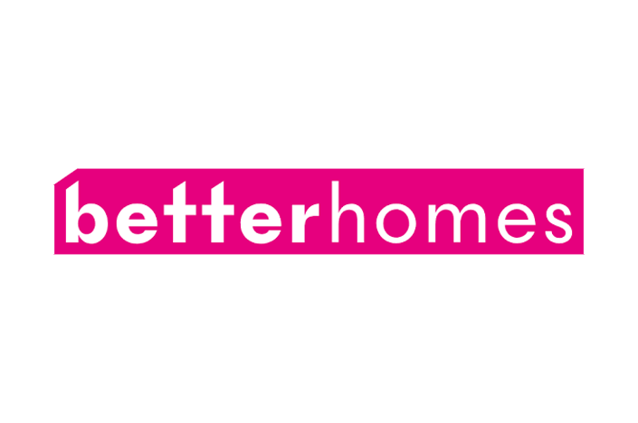 Logo with the words "Better Homes" on a pink background.